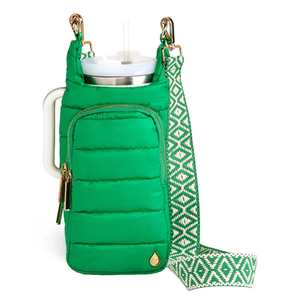 Green insulated drink holder with patterned strap on a white background