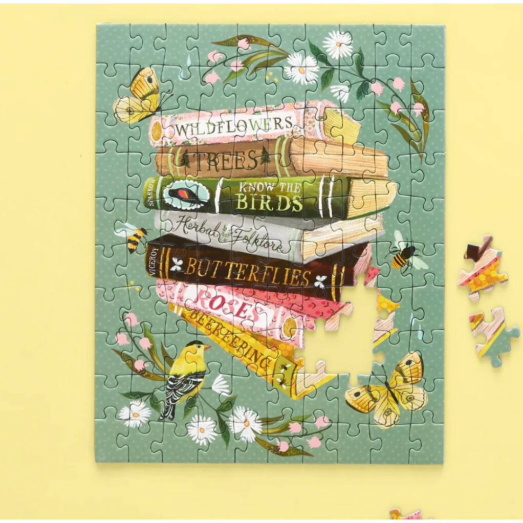 Jigsaw puzzle with nature-themed design on a yellow background