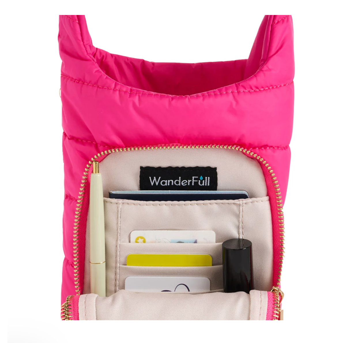 Pink crossbody bag with a visible brand label on a white background