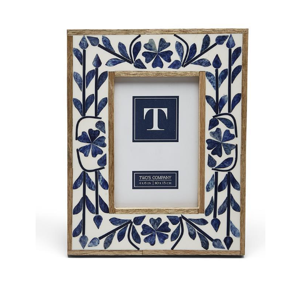 Decorative picture frame with blue floral pattern on a white background