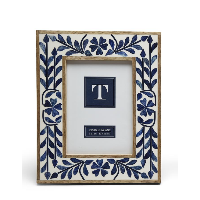 Decorative picture frame with blue floral pattern on a white background