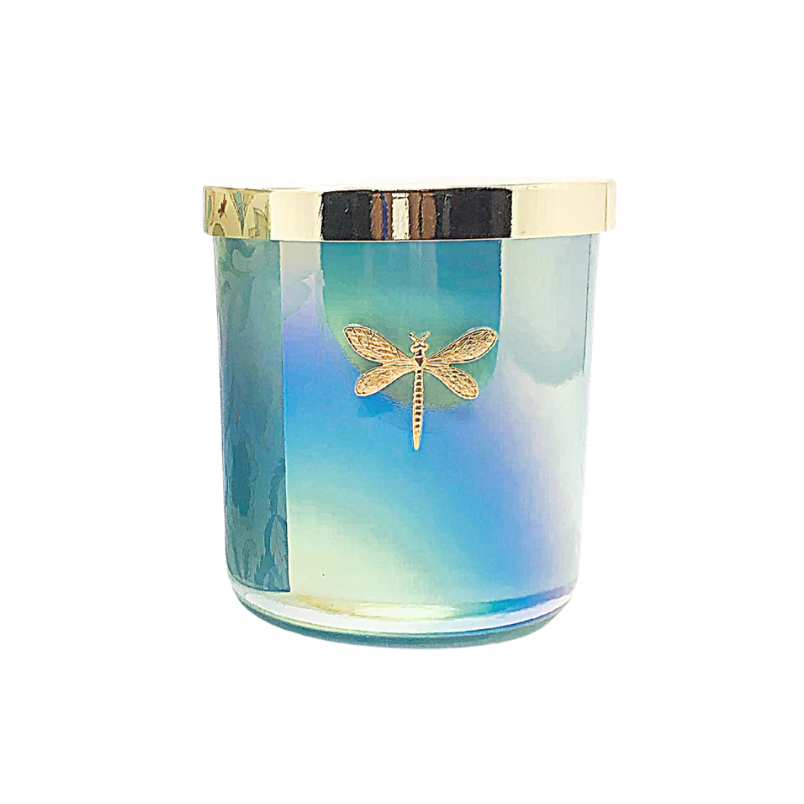 Candle with dragonfly design on a gradient blue and green glass