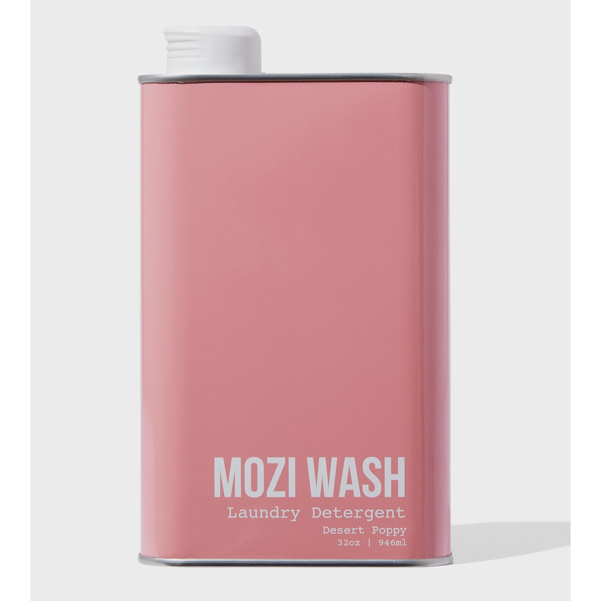 Pink can of Mozi Wash laundry detergent on a white background