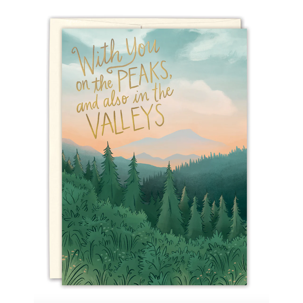 Greeting card with a forest scene and motivational quote on a white background