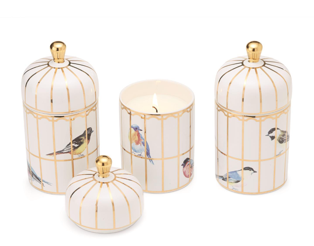 Set of decorative jars with birdcage design on a white background