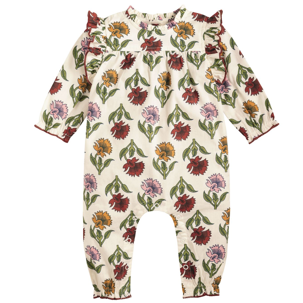 Floral patterned baby romper on a white background