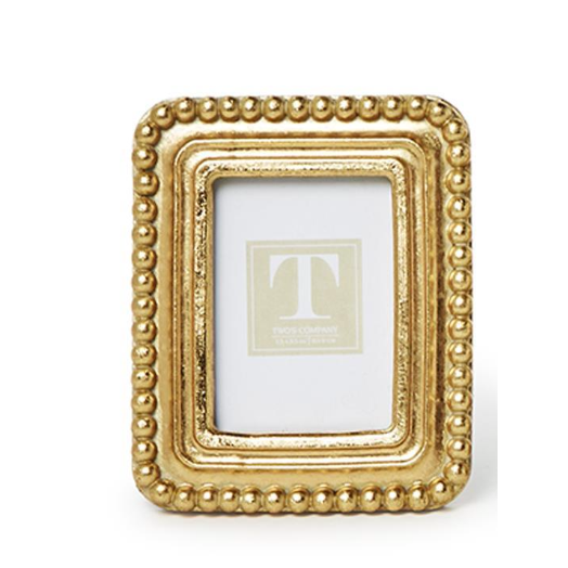 Gold decorative picture frame on a white background