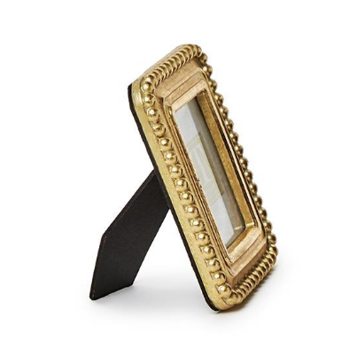 Gold decorative picture frame on a white background