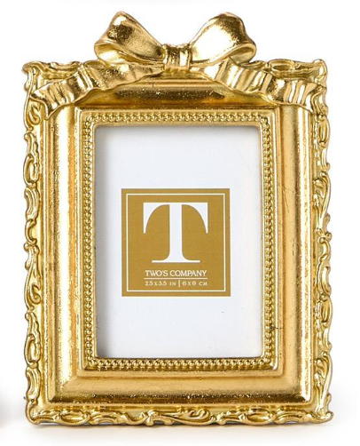 Gold decorative picture frame with a bow on top, featuring the 'Two's Company' logo.