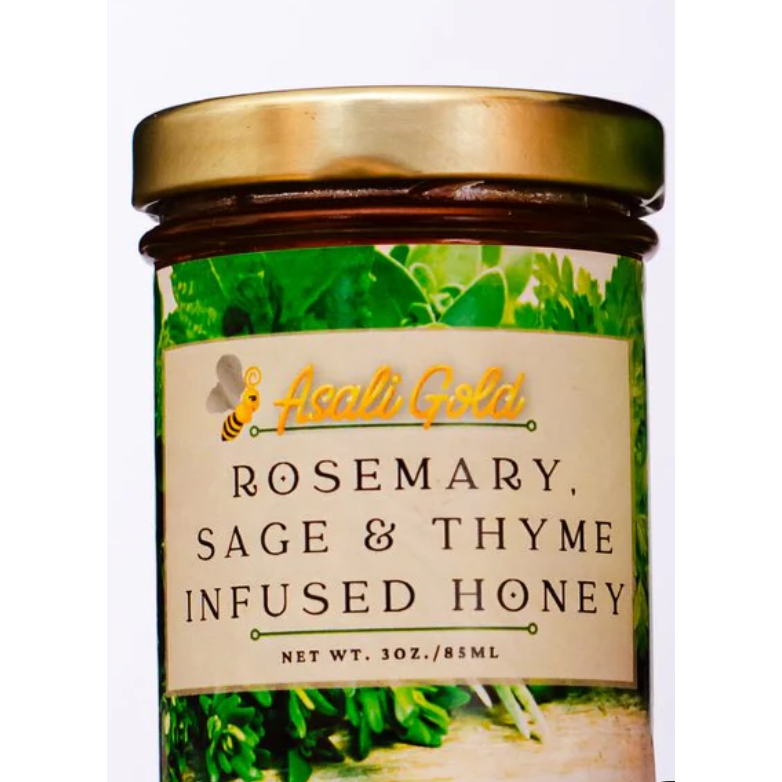 Jar of Asali Gold rosemary, sage & thyme infused honey with a gold lid.