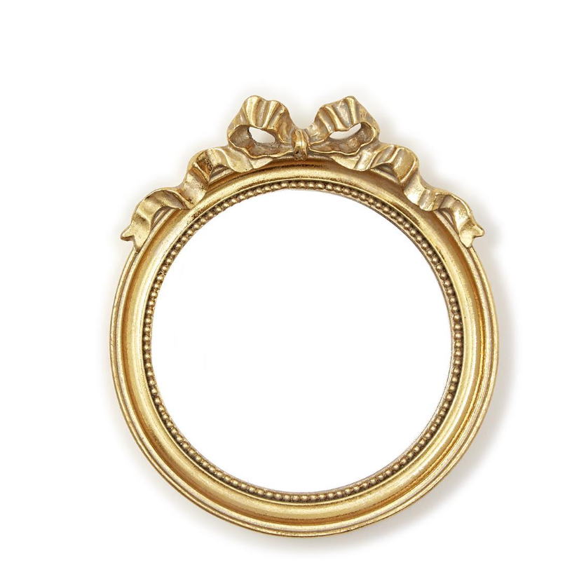 Decorative gold frame with a bow design on a white background