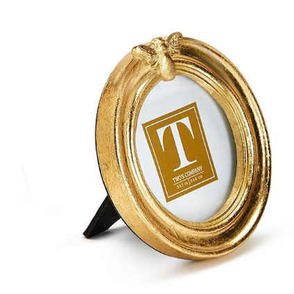 Gold decorative frame with a logo on a white background