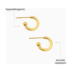 Gold hoop earrings on a white background with text indicating hypoallergenic and tarnish resistant properties.