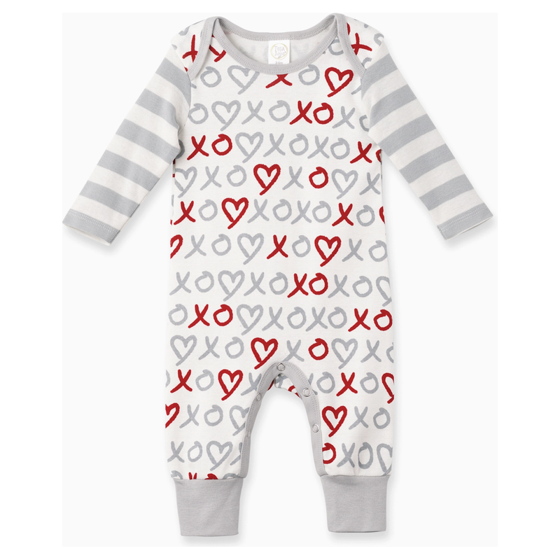 Baby onesie with heart and 'XO' pattern on a white background