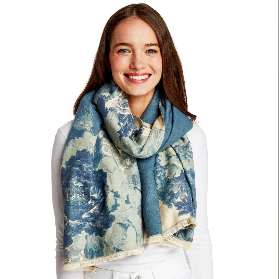 Woman wearing a blue floral scarf on a white background