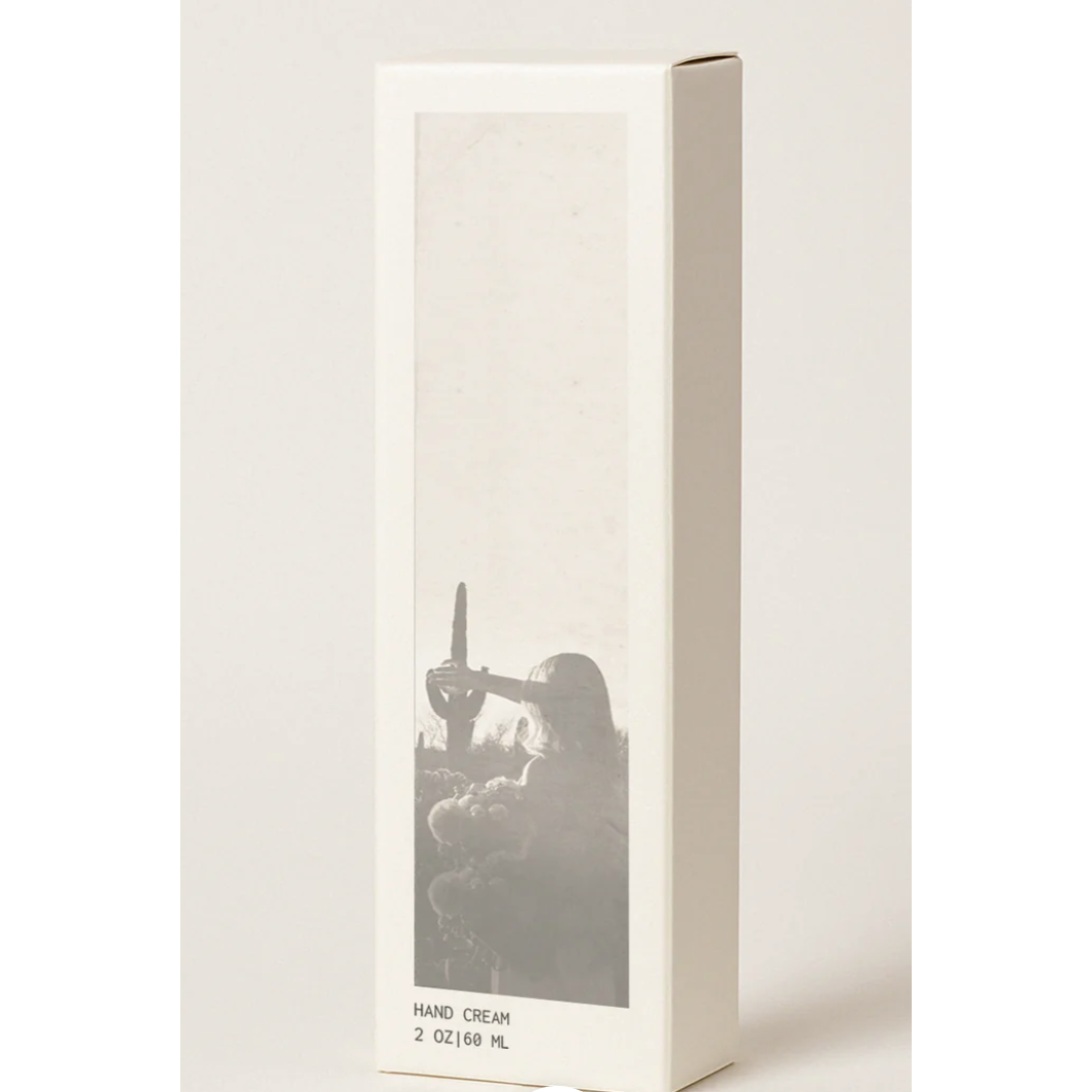 Hand cream packaging with a minimalist design on a white background