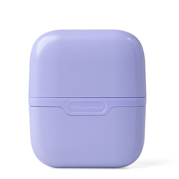 A lavender purple square-shaped silicone case with rounded corners, featuring a horizontal seam and a debossed brand name 'LEMONLAVENDER' on the front, set against a plain white background.