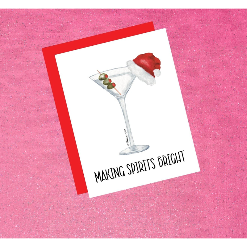 Card with a martini glass wearing a Santa hat and olives on a pink background