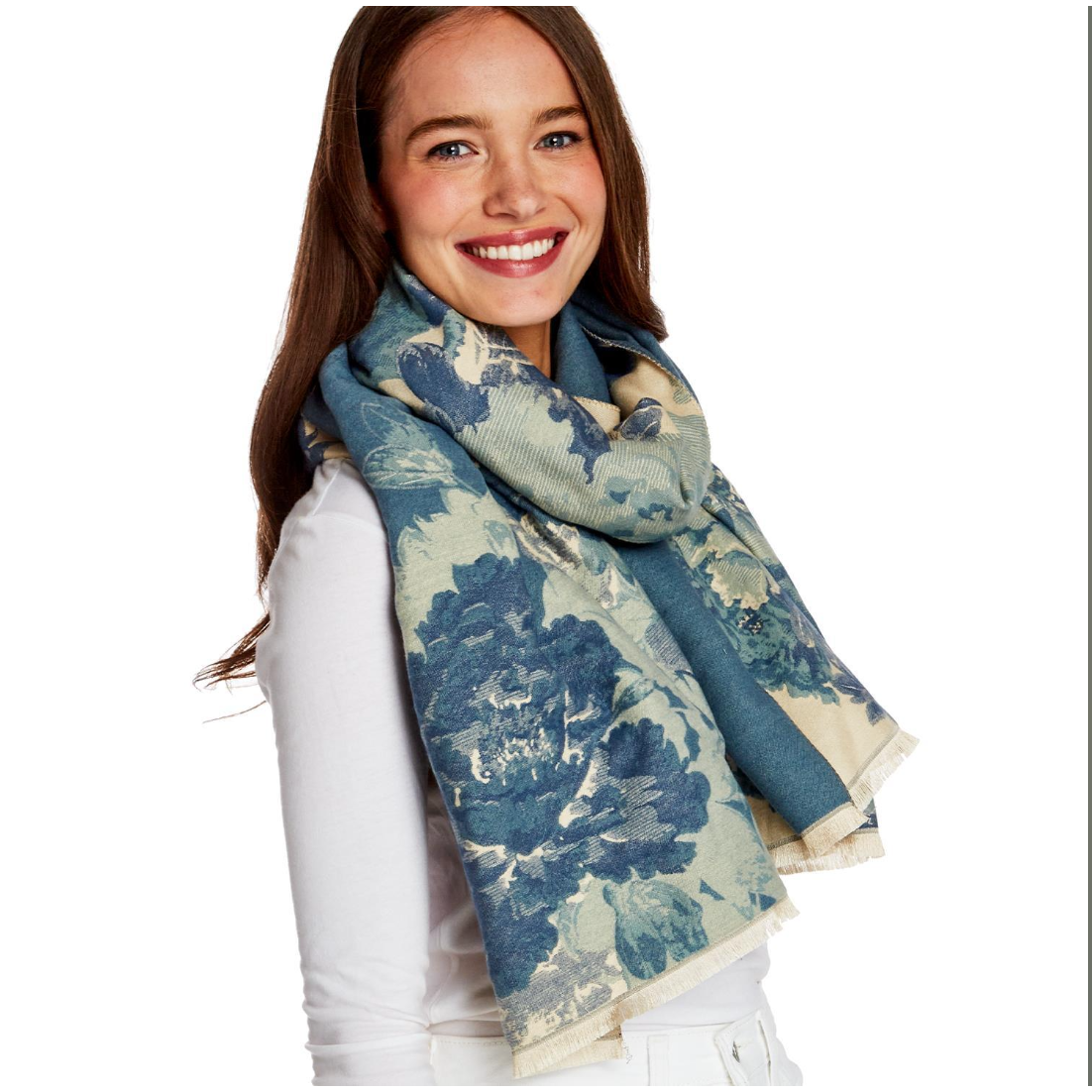 Woman wearing a blue floral patterned scarf on a white background