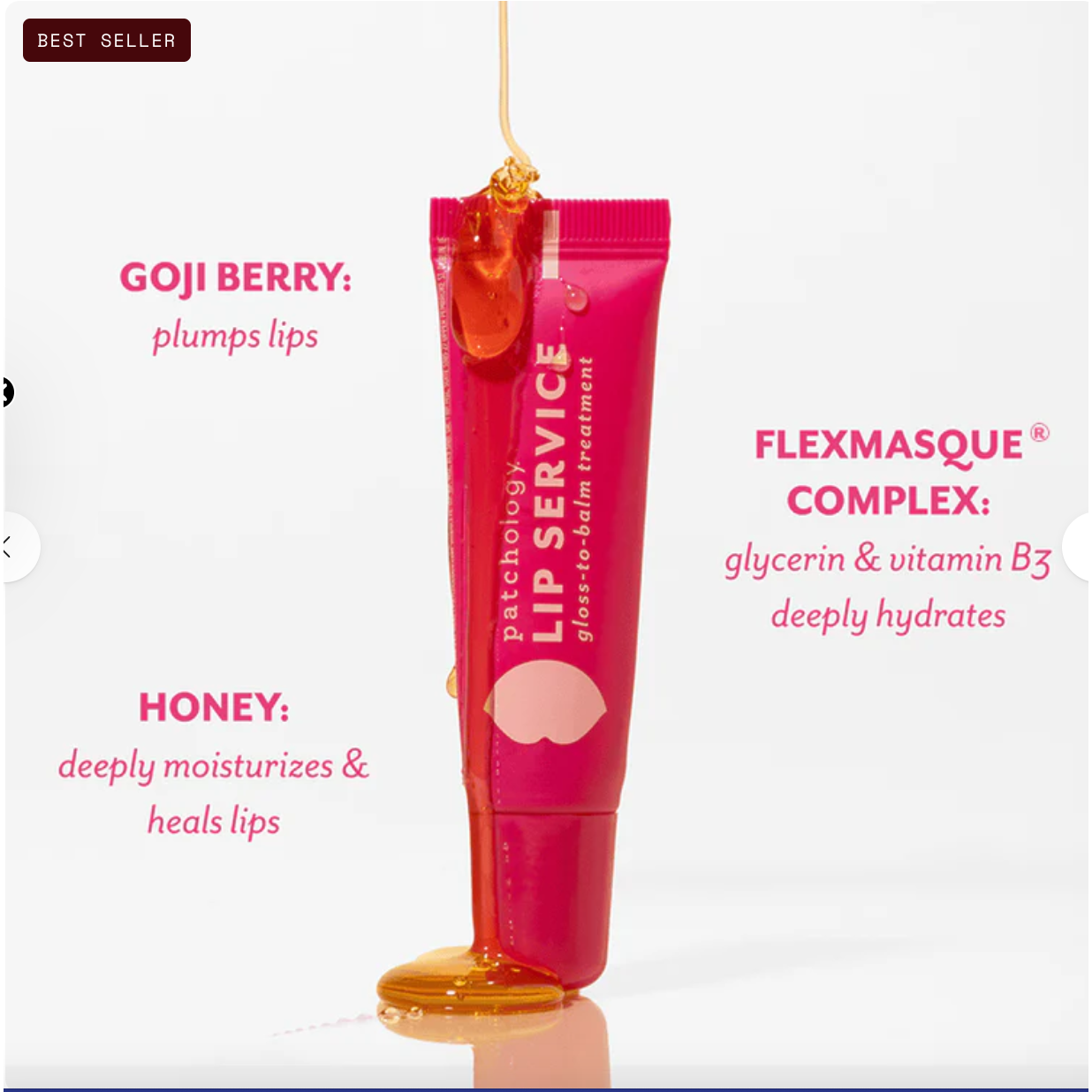 Pink lip balm tube with ingredients listed on a white background