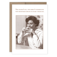 Greeting card with a woman drinking coffee and a humorous quote about roosters on a white background.