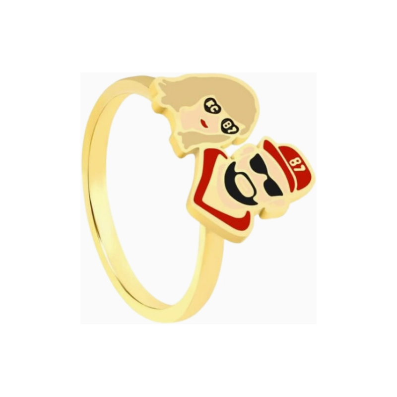 Gold ring with cartoon-style character on a white background