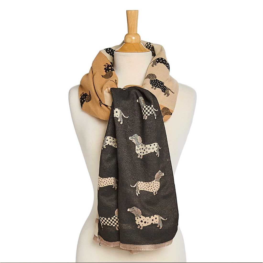 Mannequin wearing a black scarf with dog patterns and a beige scarf with animal patterns.
