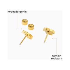 Gold earrings labeled as hypoallergenic and tarnish resistant on a white background