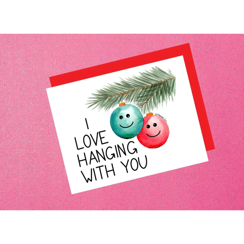 Card with Christmas ornaments and text 'I love hanging with you' on a pink background