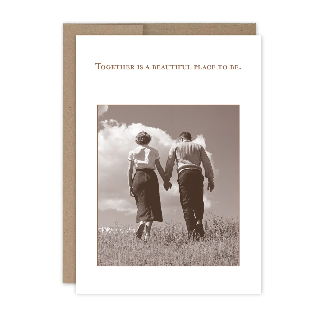 Greeting card with a black and white photo of two people walking together and text 'Together is a beautiful place to be.'