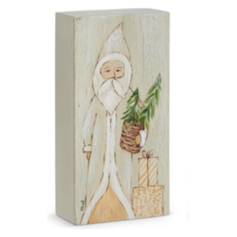Wooden block with a Santa Claus design holding a basket of gifts on a white background