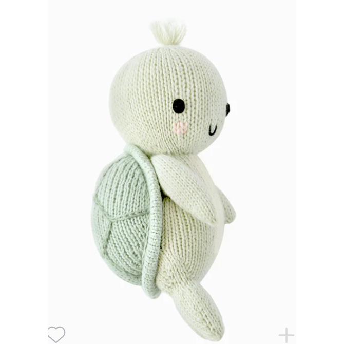 Knitted toy with a smiling face on a white background