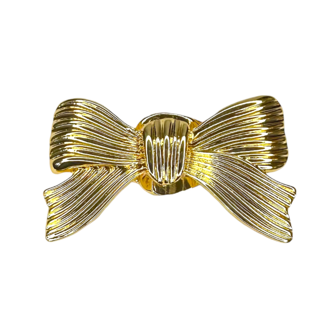 A shiny gold bow-shaped scarf slide with a ribbed, textured surface, shown against a plain white background.