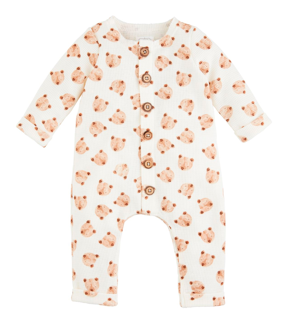 Baby onesie with bear pattern on a white background