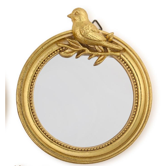 Decorative gold mirror with bird and branch design on a white background