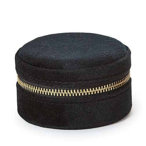 


Black round fabric box with a gold zipper on a white background