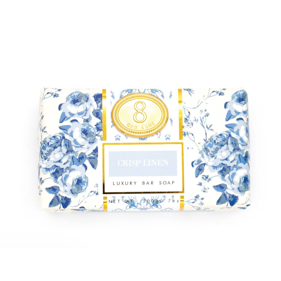 Luxury bar soap with floral packaging on a white background