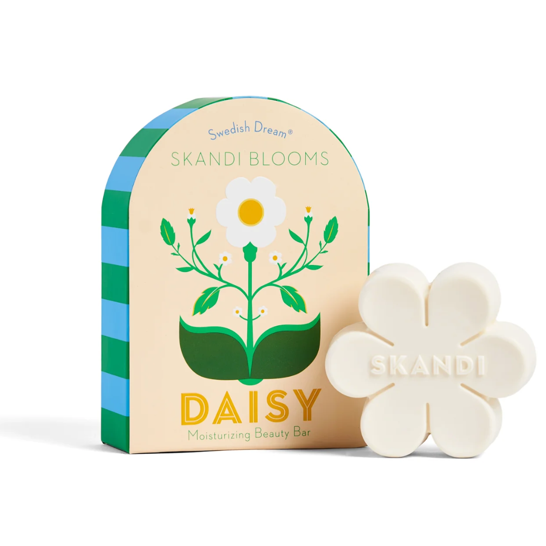 Skandi Blooms Daisy moisturizing beauty bar packaging with a daisy illustration on a white background