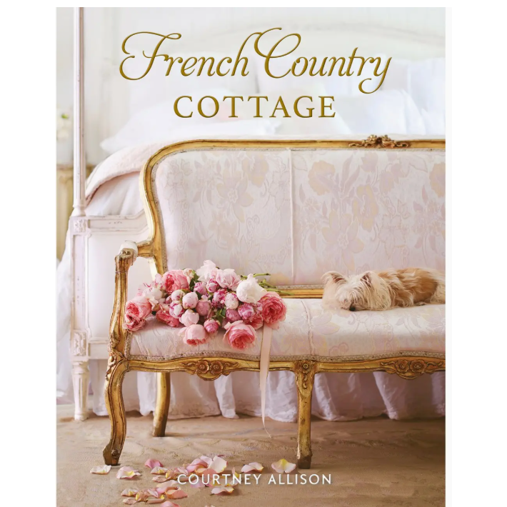 Book cover of 'French Country Cottage' by Courtney Allison featuring a decorative sofa with flowers and a dog.