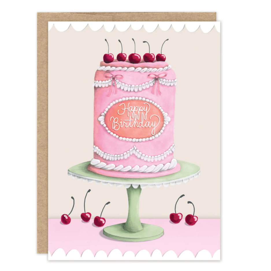 Birthday card with a pink cake illustration and 'Happy Birthday' text.