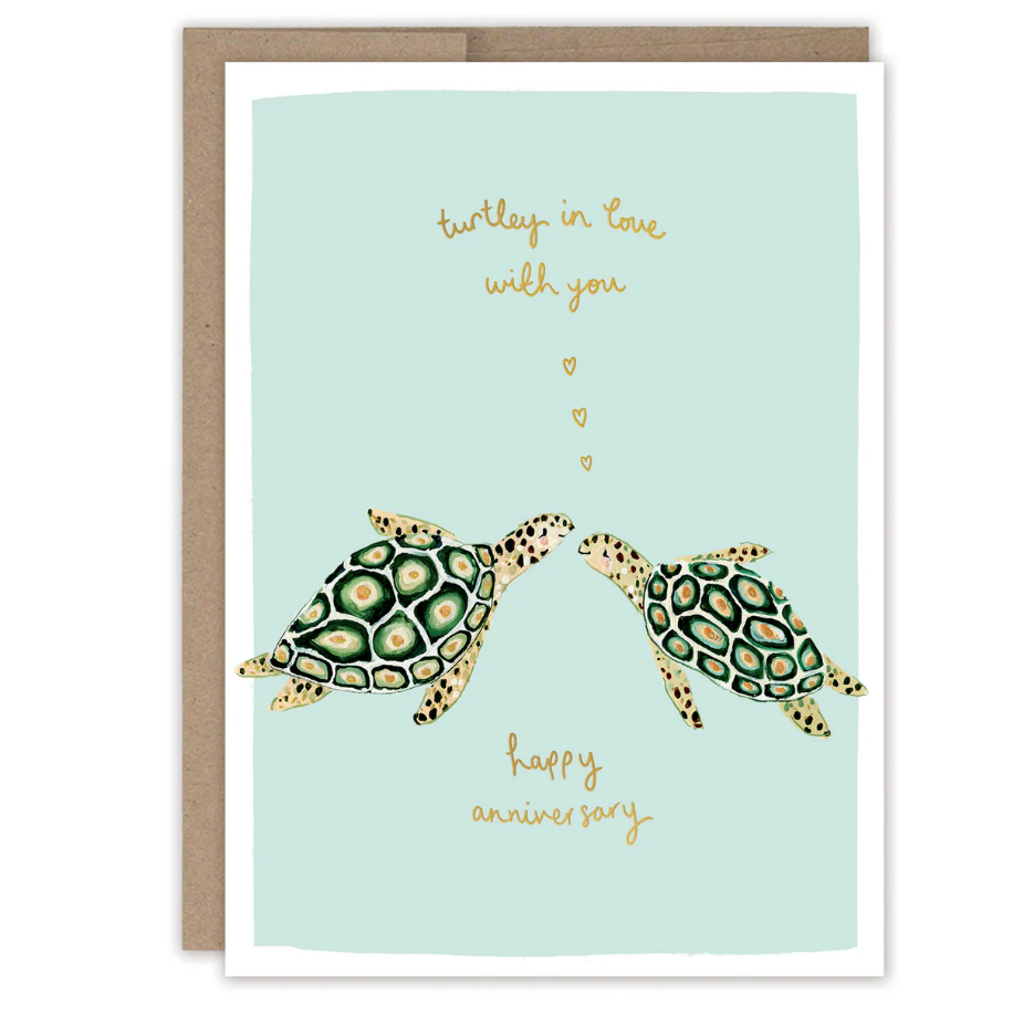Greeting card with two turtles and text 'turtle in love with you' and 'happy anniversary' on a light blue background.