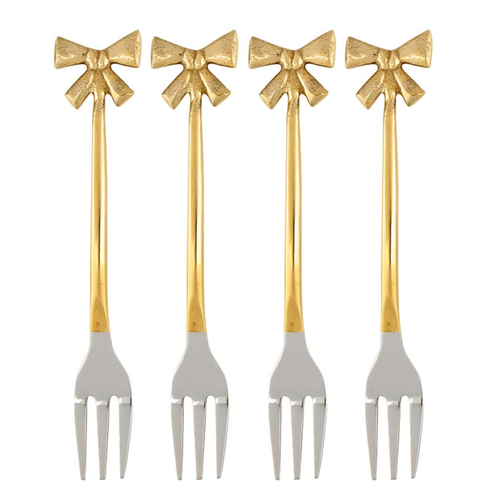 Four gold-handled silver forks with bow designs on a white background