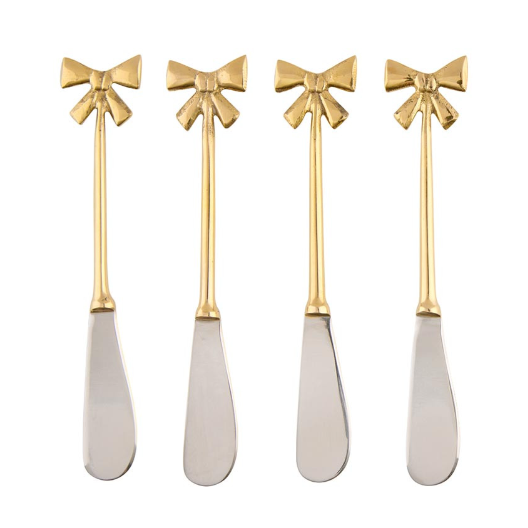 Suggestion


Four gold-handled spoons with bow designs on a white background