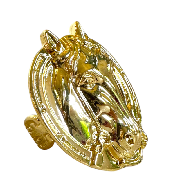 A shiny gold horse head ring with a polished metallic finish, shown on a plain white background.
