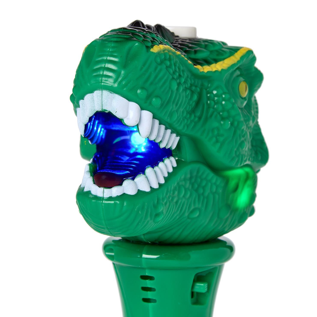 Toy dinosaur head with glowing blue mouth on a white background