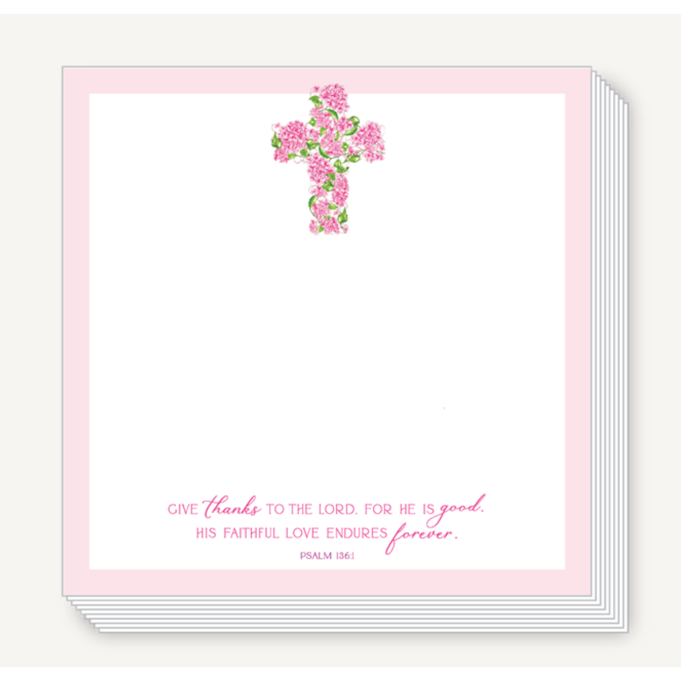Notebook with floral cross design and Bible verse on a white background