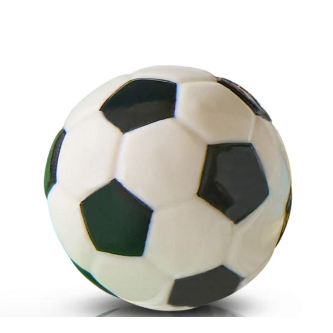 Soccer ball with black and green patterns on a white background