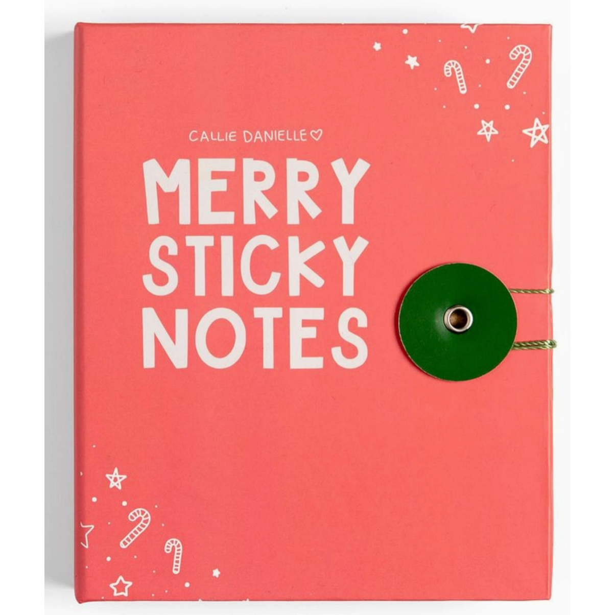 A coral pink hardcover notebook titled 'MERRY STICKY NOTES' by Callie Danielle, featuring white holiday-themed illustrations and a green circular closure on the right side.