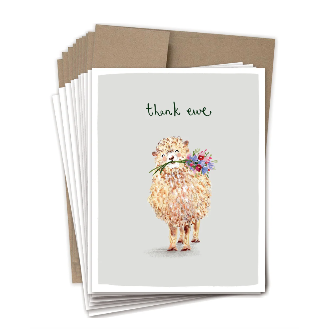 Stack of greeting cards with a sheep illustration and 'thank ewe' text on a white background.