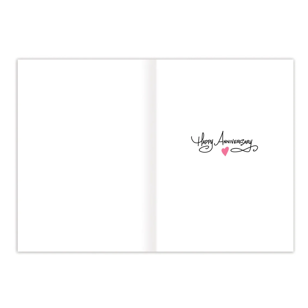 Open card with 'Happy Anniversary' text and a heart symbol on a white background